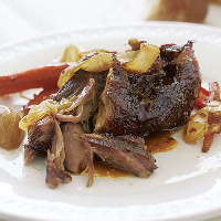 Slow-Roasted Pork Shoulder with Carrots, Onions, and Garlic